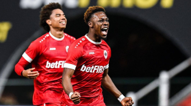 Midfielder Christopher Scott from Ghana aids Royal Antwerp in winning its first league championship in 66 years.