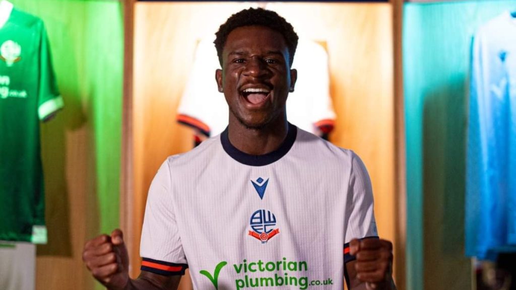 Prince Kwabena Adu of Ghana scores in the Europa League matchup.